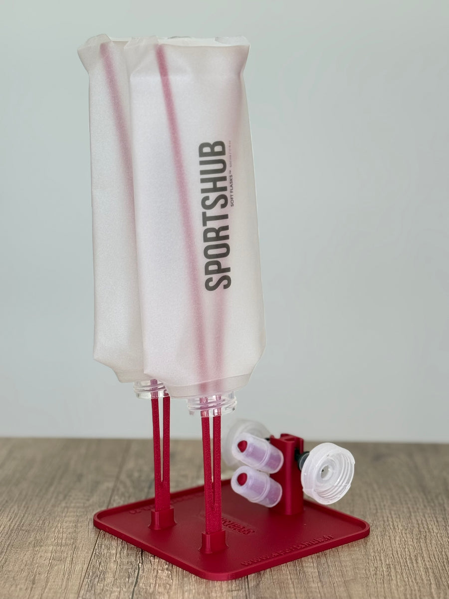 Soporte de secado SportsHub Rojo, con soft flasks colocadas para secar